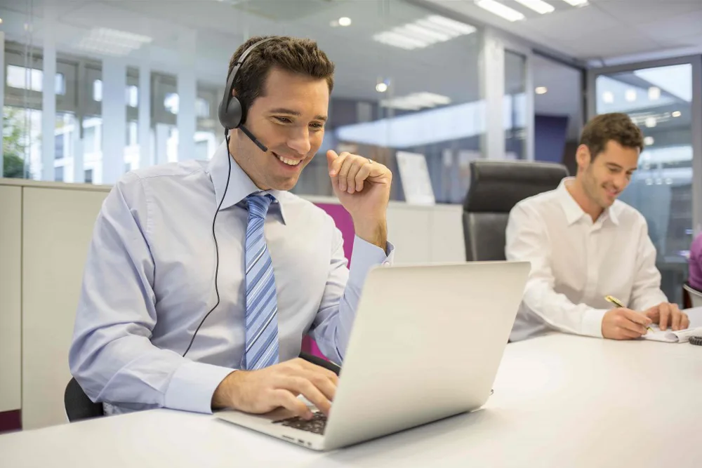 Two men professional working in an office