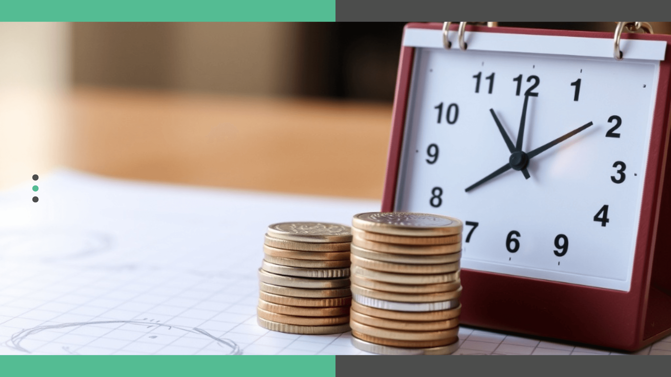 A calendar and a stack of coins on a table.